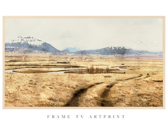May include: A watercolour painting of a landscape with a winding river, snow-capped mountains in the distance, and a dirt road leading through a field of dry grass.