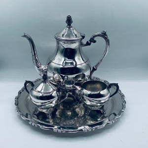 Vintage FB Rogers Silverplated 3  Piece Coffee/Tea Set on a Oneida Silverplated Round Tray