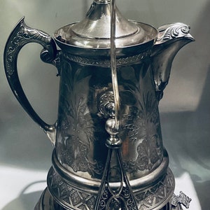 Antique 1878 Quadruple Plate Wilcox Silverplate  Tilting Water Pitcher with Stand