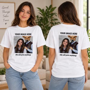 May include: A white short-sleeved t-shirt featuring a custom graphic print on the front. The print displays the text "YOUR IMAGE HERE" at the top, a photograph of a person and a dog in a sweater vest in the centre, and "(We will print anything)" below.
