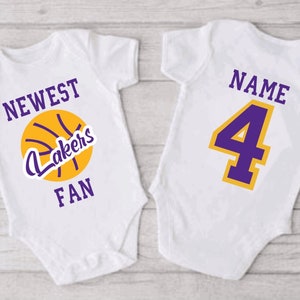 Nike Infant Los Angeles Lakers LeBron James #23 Replica Onesie NBA Jersey  Yellow