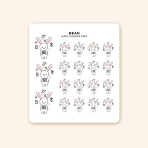 May include: A sheet of stickers featuring a cartoon bunny holding a calculator, with math symbols. The stickers have the text "BEAN MATH | KOLOUR CAFE". The bunny is white with pink ears.