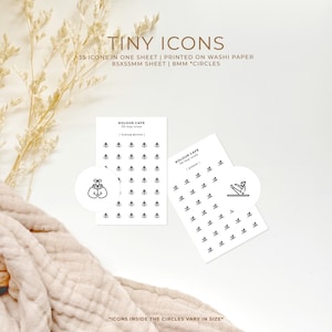 May include: Two sheets of white washi paper with black outlines of 35 tiny icons. The icons are in circles and include boxing gloves and a person doing pilates. The text on the sheets reads "KOLOUR CAFE 35 tiny icons boxing gloves" and "KOLOUR CAFE 35 tiny icons pilates". The text at the top of the image reads "TINY ICONS 35 ICONS IN ONE SHEET | PRINTED ON WASHI PAPER 85X55MM SHEET | 8MM *CIRCLES" and the text at the bottom reads "*ICONS INSIDE THE CIRCLES VARY IN SIZE*"