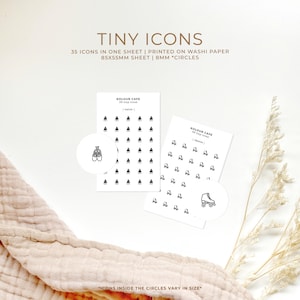 May include: Two sheets of washi paper with 35 tiny icons printed on them. The icons are in 8 mm circles and are arranged in a grid pattern. The icons include ballet shoes and roller skates. The text "KOLOUR CAFE" is printed on each sheet.