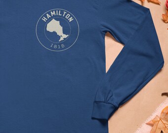 Lake Ontario long sleeve t-shirt with cities Hamilton, St. Catharines, Oakville, Mississauga, Toronto, Oshawa and more