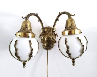 Double brass sconce Art Nouveau style  with milk glass globes lampshades