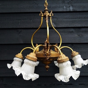 Antique French empire style gold chandelier from gilded bronze and brass with frosted glass lampshades 6 arms