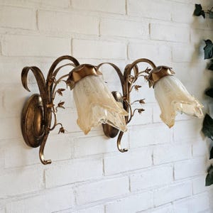 Pair of Italian tole gold sconces wall lamps with flowers, leaves and Murano glass flower lampshades, free cord, switch and plug on demand