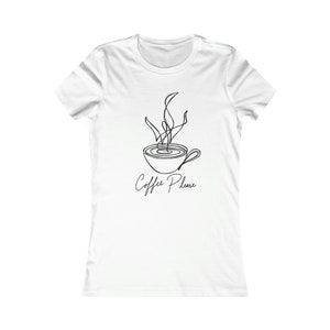 May include: White t-shirt with a black line drawing of a coffee cup with steam rising from it. The text "Coffee Please" is written below the cup.