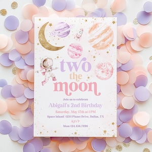 May include: A pink and purple invitation with a cartoon astronaut and planets. The text reads "two the moon" and includes details for a 2nd birthday party.