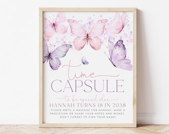 May include: A printable time capsule sign with a pink and purple butterfly design. The sign says "Time Capsule to be opened when Hannah turns 18 in 2038. Please write a message for Hannah, make a prediction or share your hopes and wishes. Don't forget to sign your name!"
