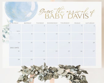 May include: A blue and white calendar with a gold balloon and the text "Guess the arrival of Baby Davis". The calendar is for the month of November and has the due date marked.