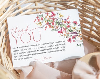 May include: A white thank you card with pink floral watercolor design. The card reads "Thank you so much for coming to my shower! I had such a wonderful time with you and it was so fun to catch up and share memories together. We love the gift you gave us. It's perfect, thank you! We look forward to celebrating with you at the wedding! Love, Olivia."