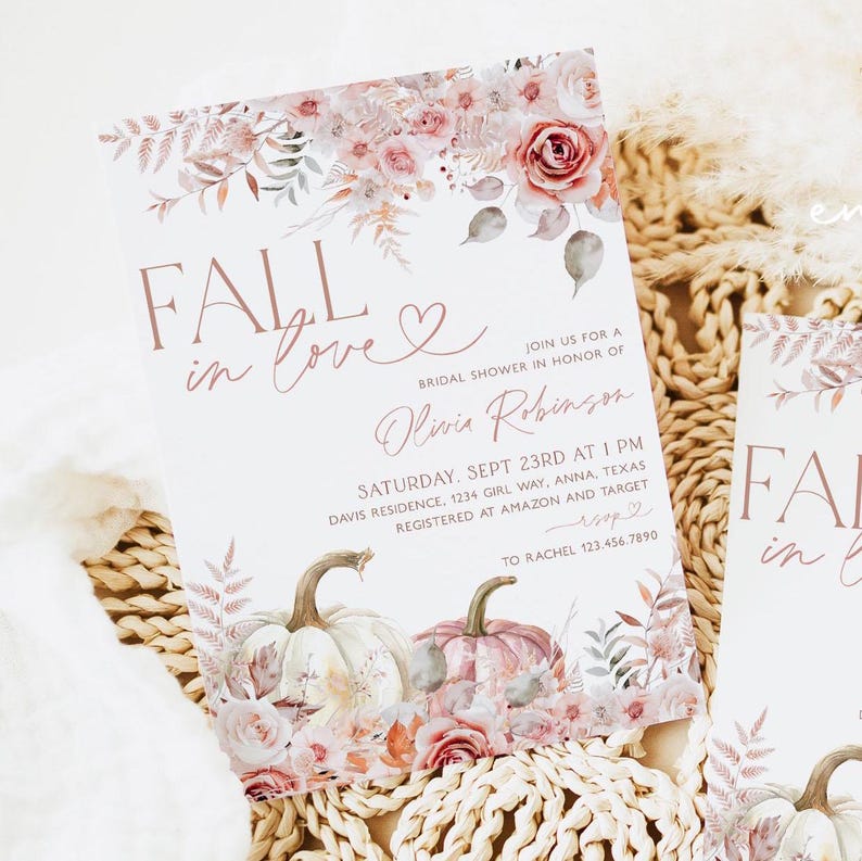 May include: Fall in love bridal shower invitation with a watercolor floral design featuring pumpkins and leaves in shades of pink, peach, and gray. The text reads "Fall in love" with a heart and "Join us for a bridal shower in honor of Olivia Robinson".