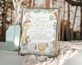 Könnte beinhalten: Ein grünes und goldenes Zeitkapsel-Schild mit Dschungeltieren und dem Text "Time Capsule To Be Opened On Jackson's 18th Birthday May 17, 2024 Please write a message for Jackson, make a prediction or share your hopes and wishes. Don't forget to sign your name!"