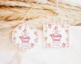 May include: Two pink and white gingham patterned thank you tags with a strawberry and flower design. The text on the tags reads "Thank You! Berry Much for Coming! Love, Penelope".