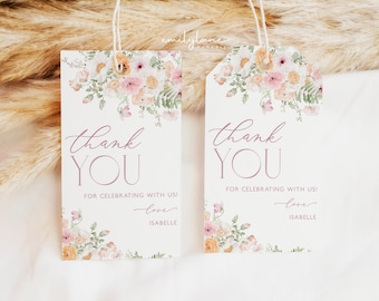 Op de afbeelding: Twee bloemige bedankkaartjes met de tekst "dankjewel" in een handschrift. De tekst "voor het vieren met ons!" staat onder de groet. De tekst "liefs, Isabelle" staat onderaan elk kaartje.
