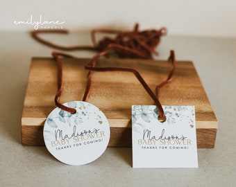 May include: Two baby shower favor tags with a watercolor eucalyptus design. The round tag says "Madison's Baby Shower Thanks for coming!" and the square tag says "Madison's Baby Shower Thanks for coming!"