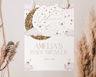 Może przedstawiać: Biały znak na baby shower z pozłacanym półksiężycem i różowymi chmurami. Na znaku widnieje napis "Witamy na Baby Shower Amelii" oraz "11 marca 2023".