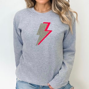Lightning bolt jumper ladies shop