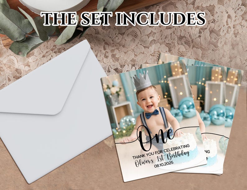 May include: A set of birthday party invitations and envelopes. The invitations feature a photo of a baby wearing a crown and bow tie, with the word "One" and birthday details.