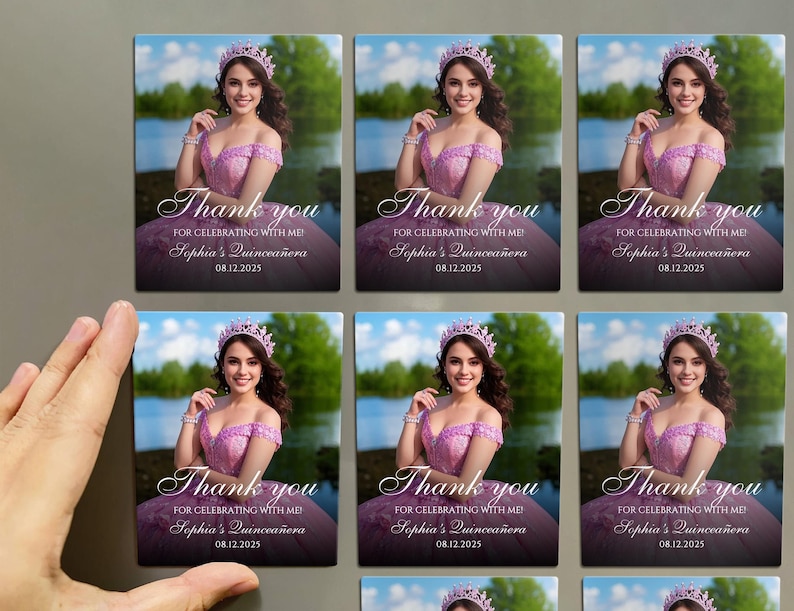 May include: Square magnets featuring a woman in a pink dress and tiara. The text "Thank you" and "Sophia's Quincea&ntilde;era" are displayed. The date "08.12.2025" is also visible. The magnets are displayed on a gray surface.