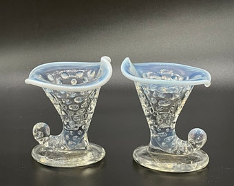 Set of two Fenton white to clear hobnail opalescent cornucopia art glass horn vases