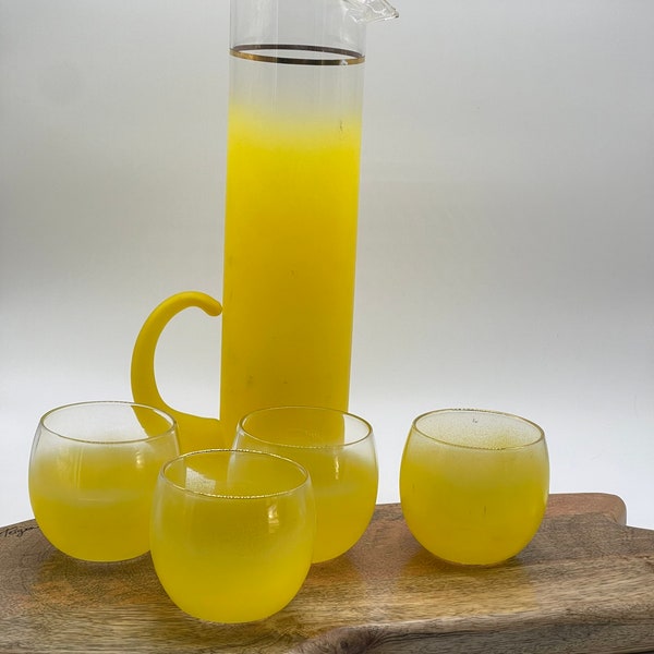 Blendo yellow drink pitcher and 4 juice or drink Roly Poly glasses