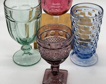 Older water goblets from different makers set of 4. Green Libby, cranberry Bartlett,  blue Whitehall, and a purple Imperial