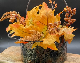 Round bucket with relief fall design for seasonal decor