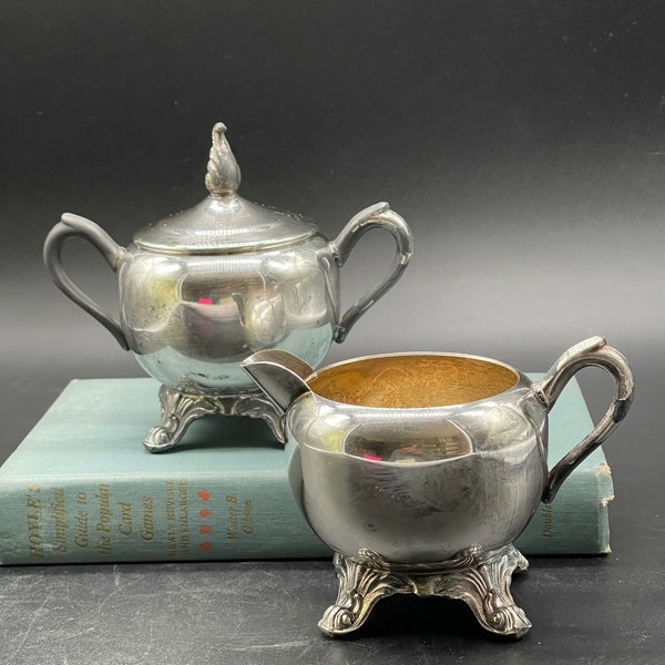 Rare set of footed Rogers silver sugar and creamer