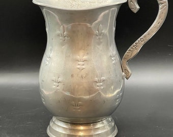 Pewter fleur de lis hollowware water pitcher from India