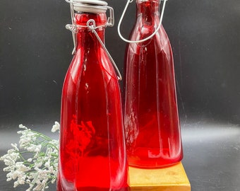 Pair of two RED lidded bottles, vases, decor with stoppers