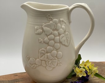Unmarked vintage grape relief white Pitcher