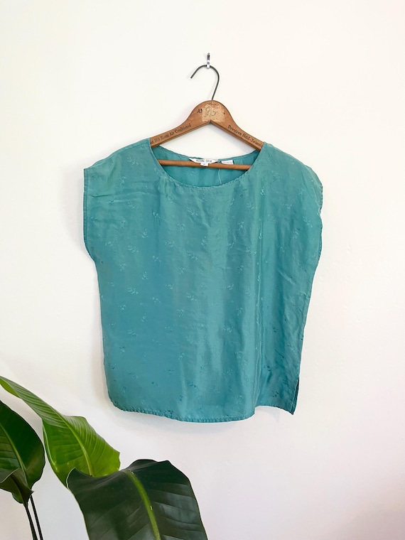 Blusa vintage de seda azul agua de los años 60 España