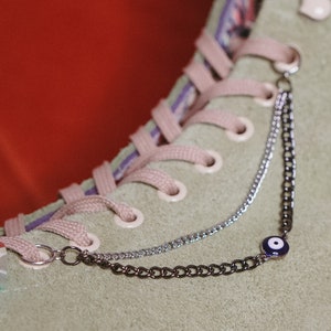Evil Eye Roller Skate Chain: Two-Tone Silver Lacelet