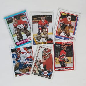 May include: A selection of six hockey trading cards showcasing Patrick Roy, the Montreal Canadiens' goaltender. The cards depict Roy in his red and white uniform, with the team logo. The cards are from the O-Pee-Chee series.