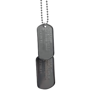 May include: Two silver dog tags on a silver ball chain necklace. The top tag reads "HORRISON JACK FRANCIS 06 0000 0076 CATHOLIC" and the bottom tag reads "HORRISON JACK FRANCIS 06 0000 0076 CATHOLIC".
