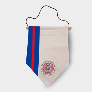 King Charles III Coronation Linen Flag OFFICIAL EMBLEM - British Monarchy Celebration - 6th May 2023 Souvenir - Blue & Red Stripes