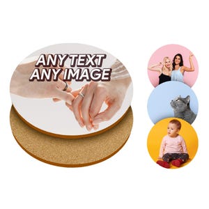 May include: A circular coaster with a cork base and a white top. The top displays the text "ANY TEXT ANY IMAGE" in a brown and white font, with an image of two hands wearing rings. Additional images of people, a cat, and a baby are also present.