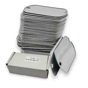 May include: A stack of 100 blank silver metal dog tags with a small hole at the top. The tags are in a cardboard box with the text "Colour: White, Material: Metal, QTY: 100 PCS".