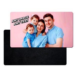 May include: A family portrait of a couple and their two daughters. The family are standing in front of a pink background. The image includes the text "ANY IMAGE ANY TEXT".