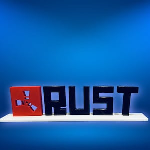 Rust Videogame Stand-Up Sign with Rust Logo, Text, and Base