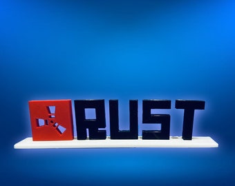 Rust Videogame Stand-Up Sign with Rust Logo, Text, and Base