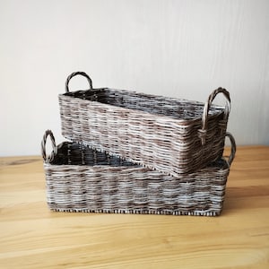 Wicker rectangular gray toilet paper basket. Toilet paper holder. Bathroom storage.