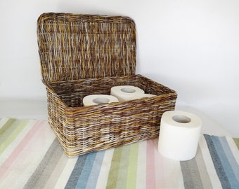 Rectangular toilet paper bin with lid in the bathroom. Storage basket.