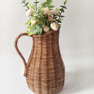 Wicker vase for flowers. Basket for artificial flowers or dried flowers. Decorative jug for home decoration. Photo props for home. image 1