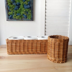 Set of two bathroom baskets. A wicker rectangular basket for toilet paper and a small round one for small items. Toilet paper holder. 7