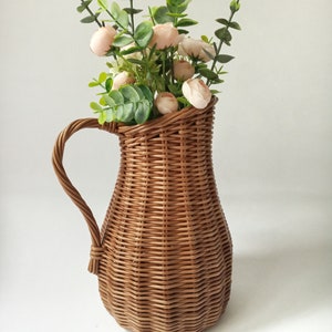 Wicker vase for flowers. Basket for artificial flowers or dried flowers. Decorative jug for home decoration. Photo props for home. image 4