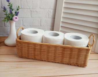 Wicker rectangular toilet paper basket in straw color. Toilet paper holder. Bathroom storage.